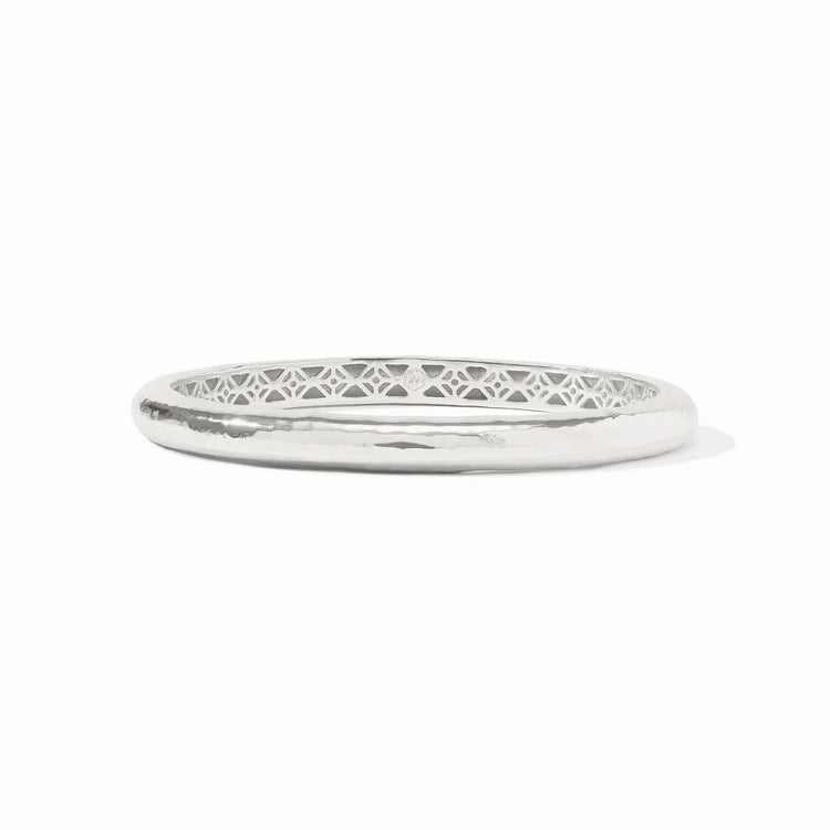 Silver Havana bangle with hand-hammered finish and geometric piercework interior.