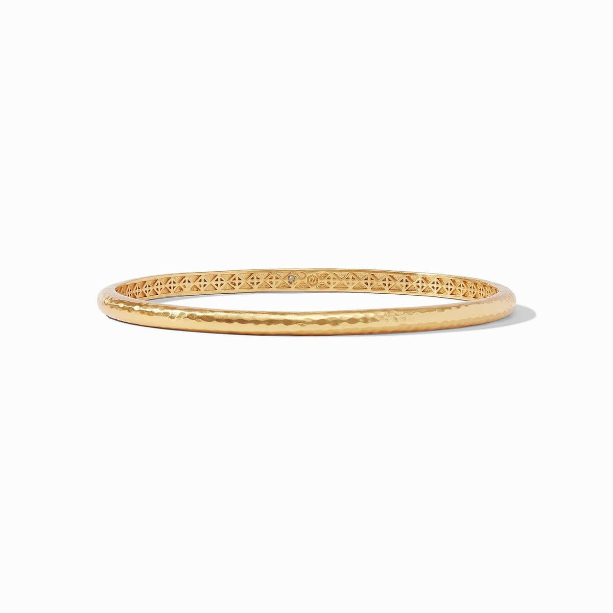 Gold Havana Demi Bangle with hand-hammered finish and geometric bas relief interior.