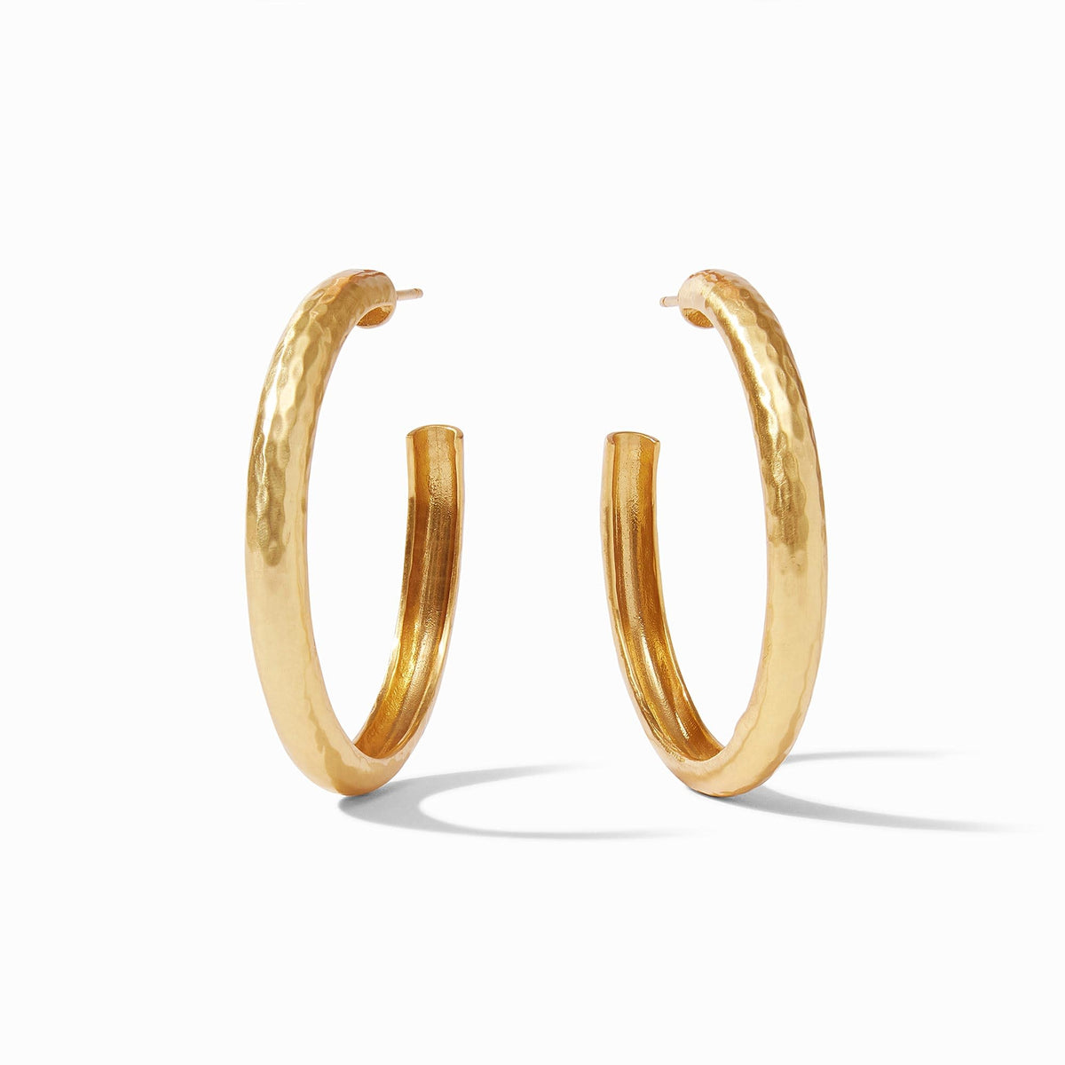 Havana Hoop earrings in a warm brown tone with a smooth circular silhouette.