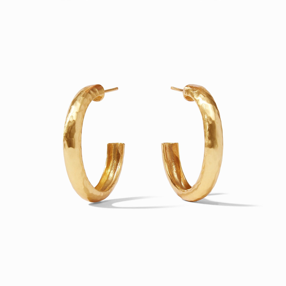 Medium-sized Havana hoop earring in a warm brown tone with a smooth circular silhouette.
