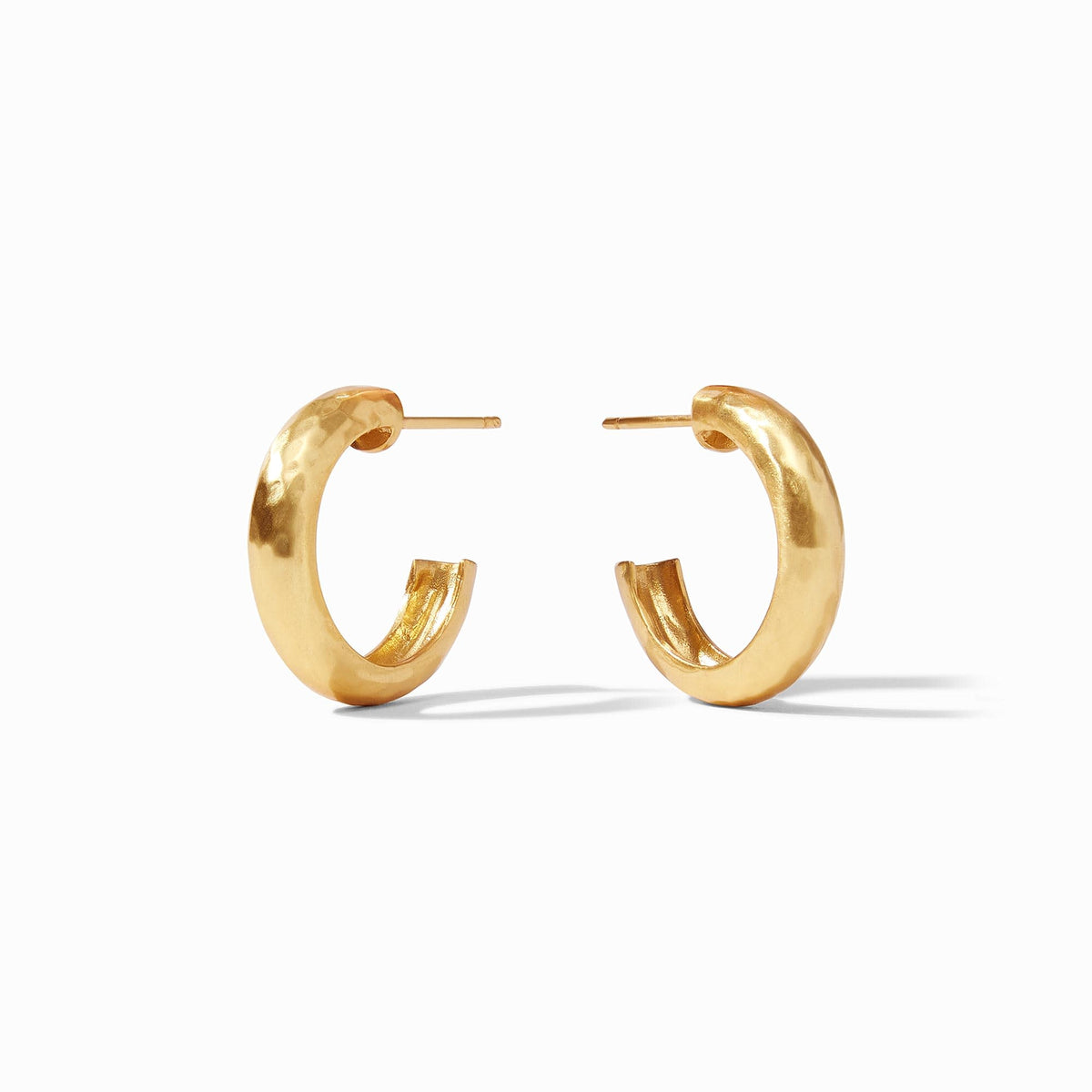 Small Havana-colored hoop earring with a smooth circular silhouette.
