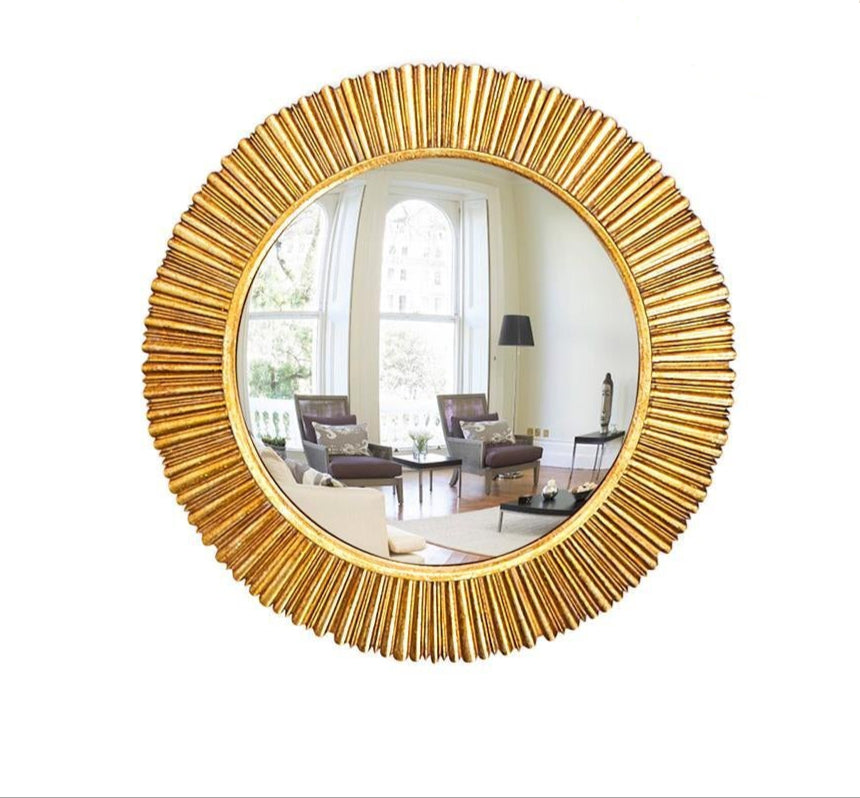 Gold convex wall mirror with intricate resin frame