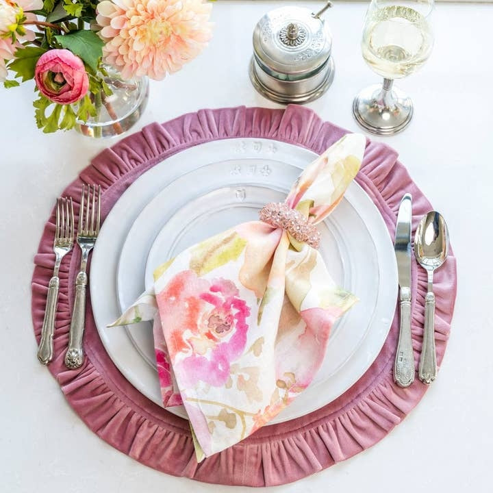 Round ruffle velvet placemat in soft neutral tone with scalloped edge detail