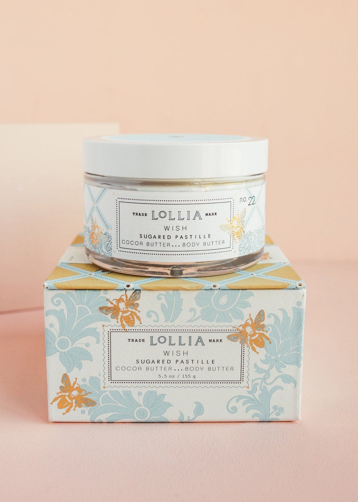 Wish Body Butter in a French-inspired blue foulard box with golden bee accents.