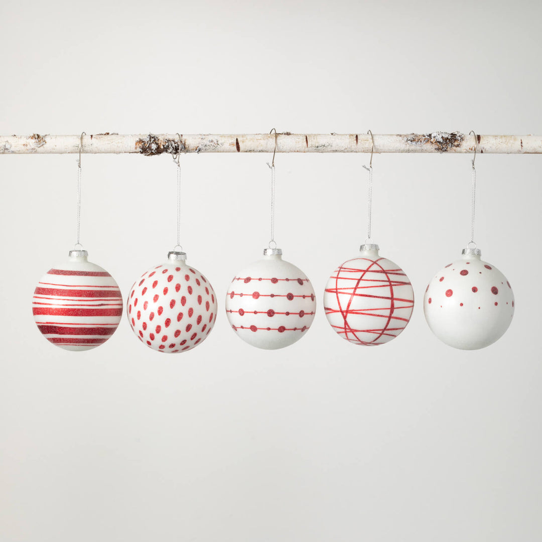Glass ball ornament with multicolor patterns in a spherical shape.