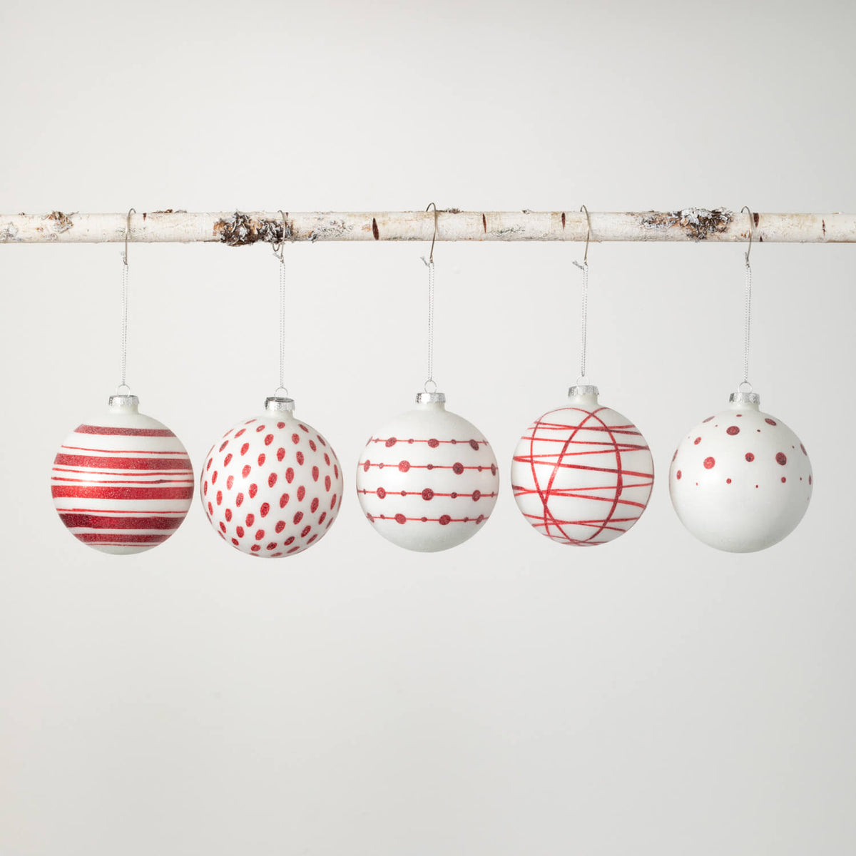 Glass ball ornament with multicolor patterns in a spherical shape.