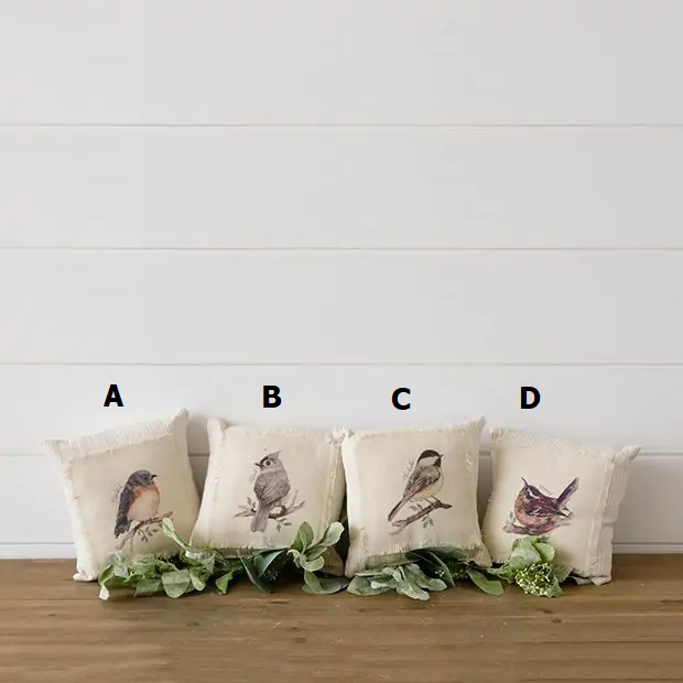 Mini cotton pillow featuring a bird-on-branch print with an eight-inch square silhouette.
