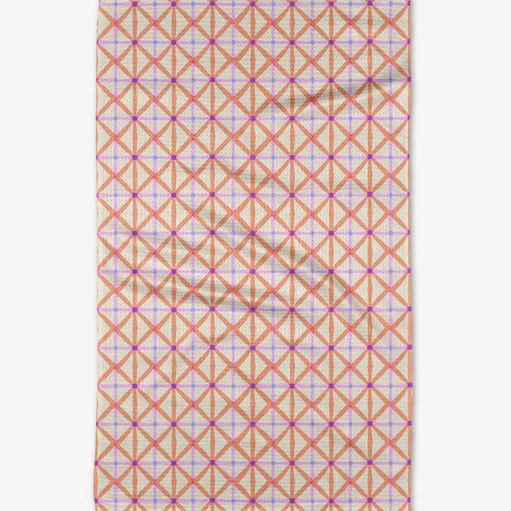 Recycled polyester waffle weave tea towel with single-sided print.