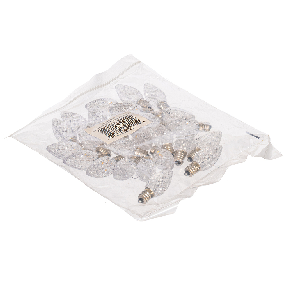 Bag of 25 C7 LED warm white faceted replacement bulbs with clear diamond-textured covers.