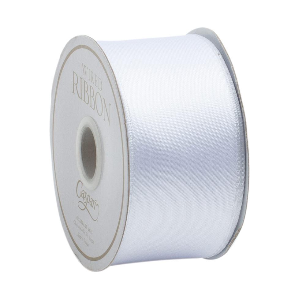 A roll of wired ribbon in a neutral tone with subtle texture.