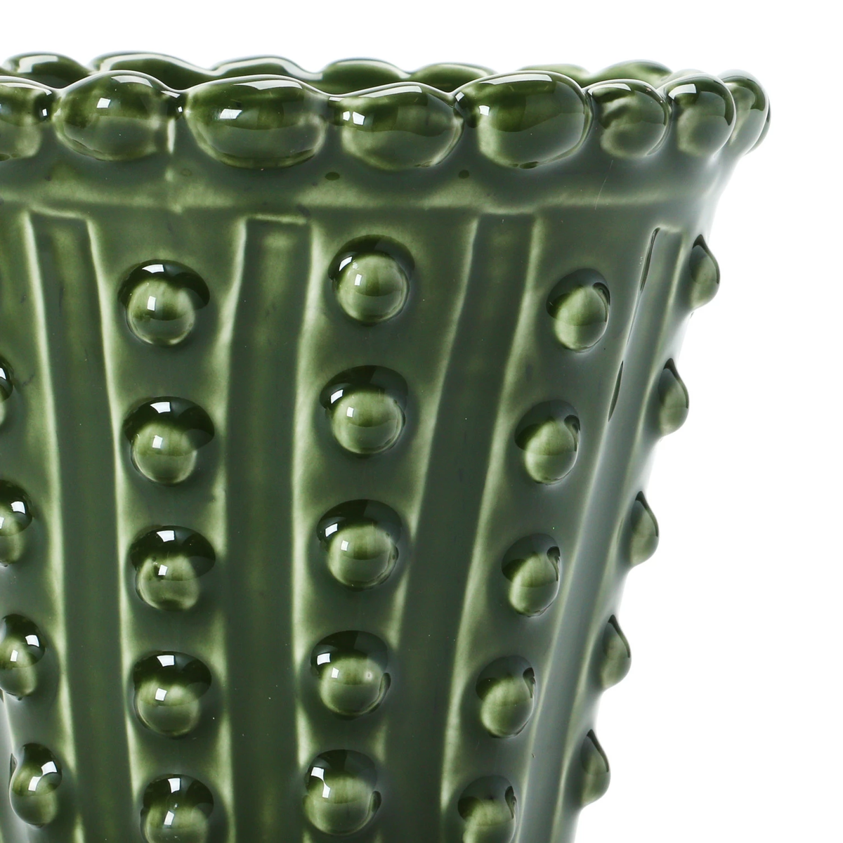Round green stoneware hobnail planter with solid bottom holding a small succulent.