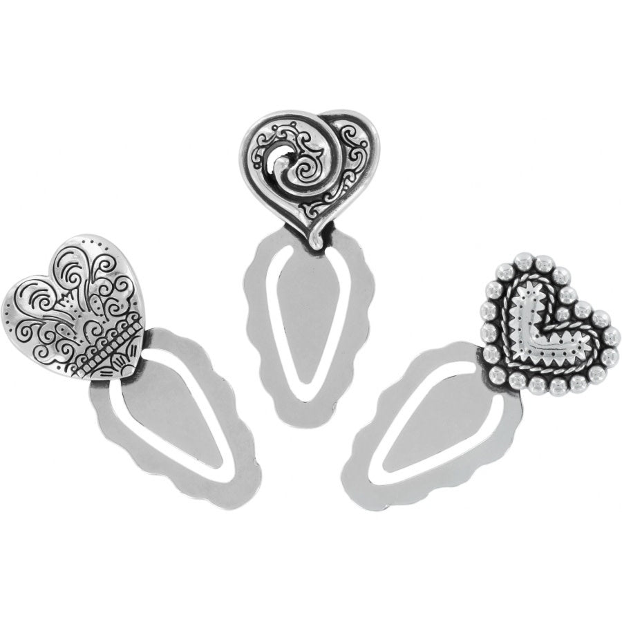 Silver plated heart shaped page marker with a smooth finish.