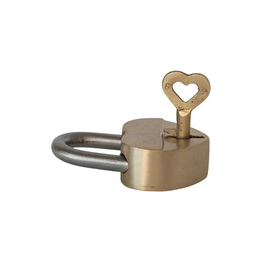 Heart-shaped brass lock with matching heart key featuring intricate detailing