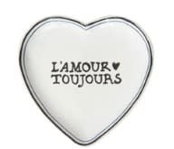 Ceramic heart-shaped tray with a glossy finish in soft pink tones
