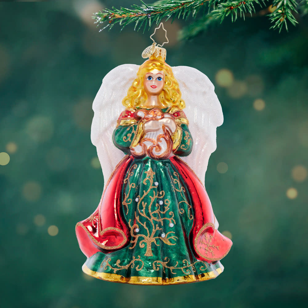 Heavenly Harpist angel ornament with celestial wings holding a harp