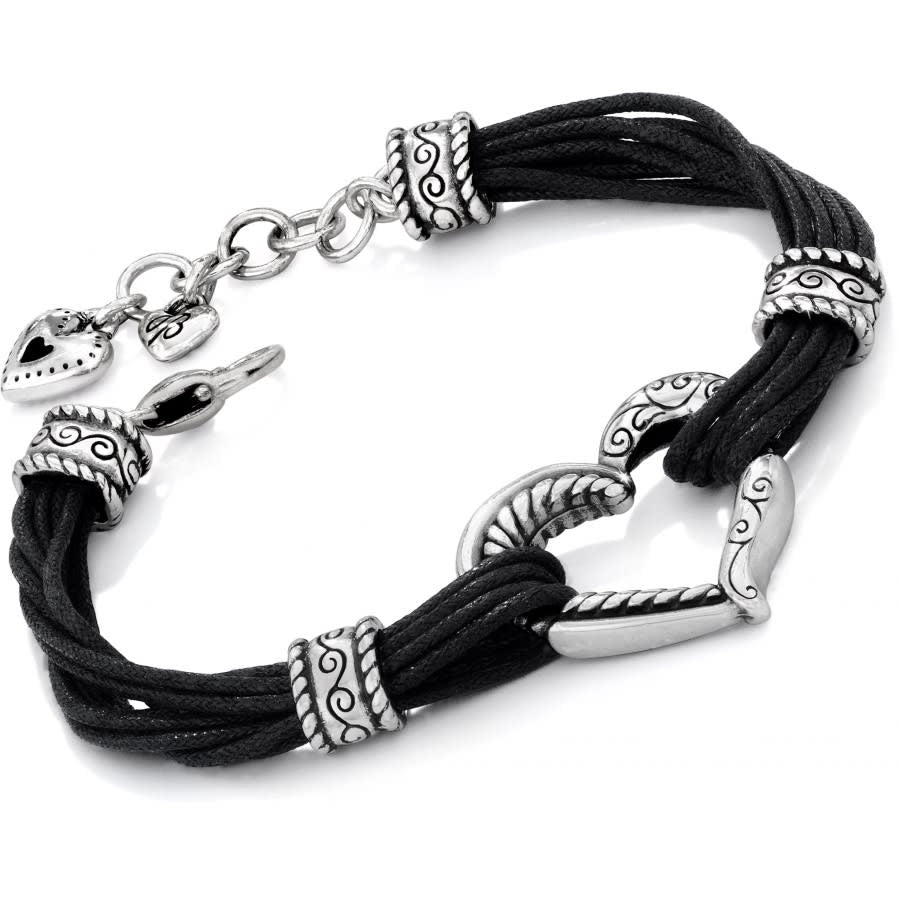 Adjustable silver-plated cotton cord bracelet featuring a black heritage heart pendant.