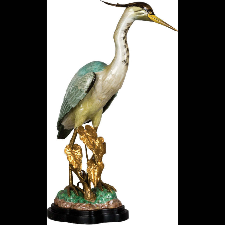 Bronze-accented heron sculpture with natural elegance