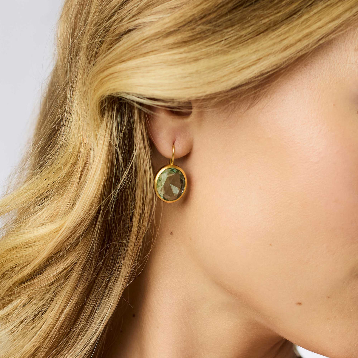 Laguna Stone earring with imported glass stone set in gold plate on a French wire.