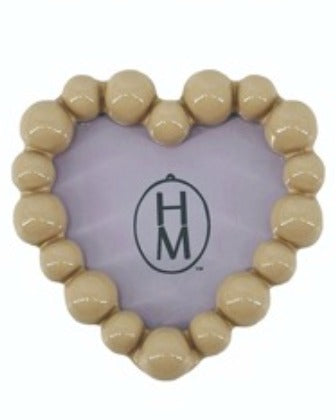 Tan resin heart-shaped photo frame magnet with a beaded border design.