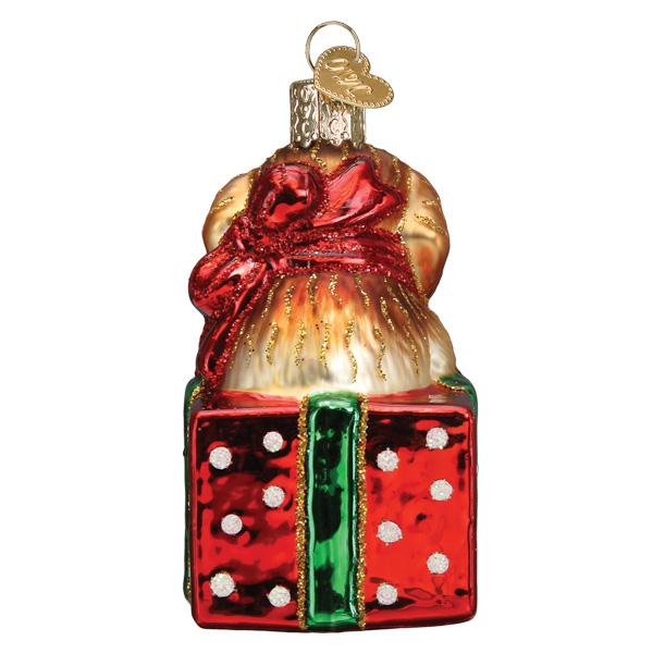 Golden Puppy Surprise Ornament featuring a golden retriever puppy in a red polka dot gift box.