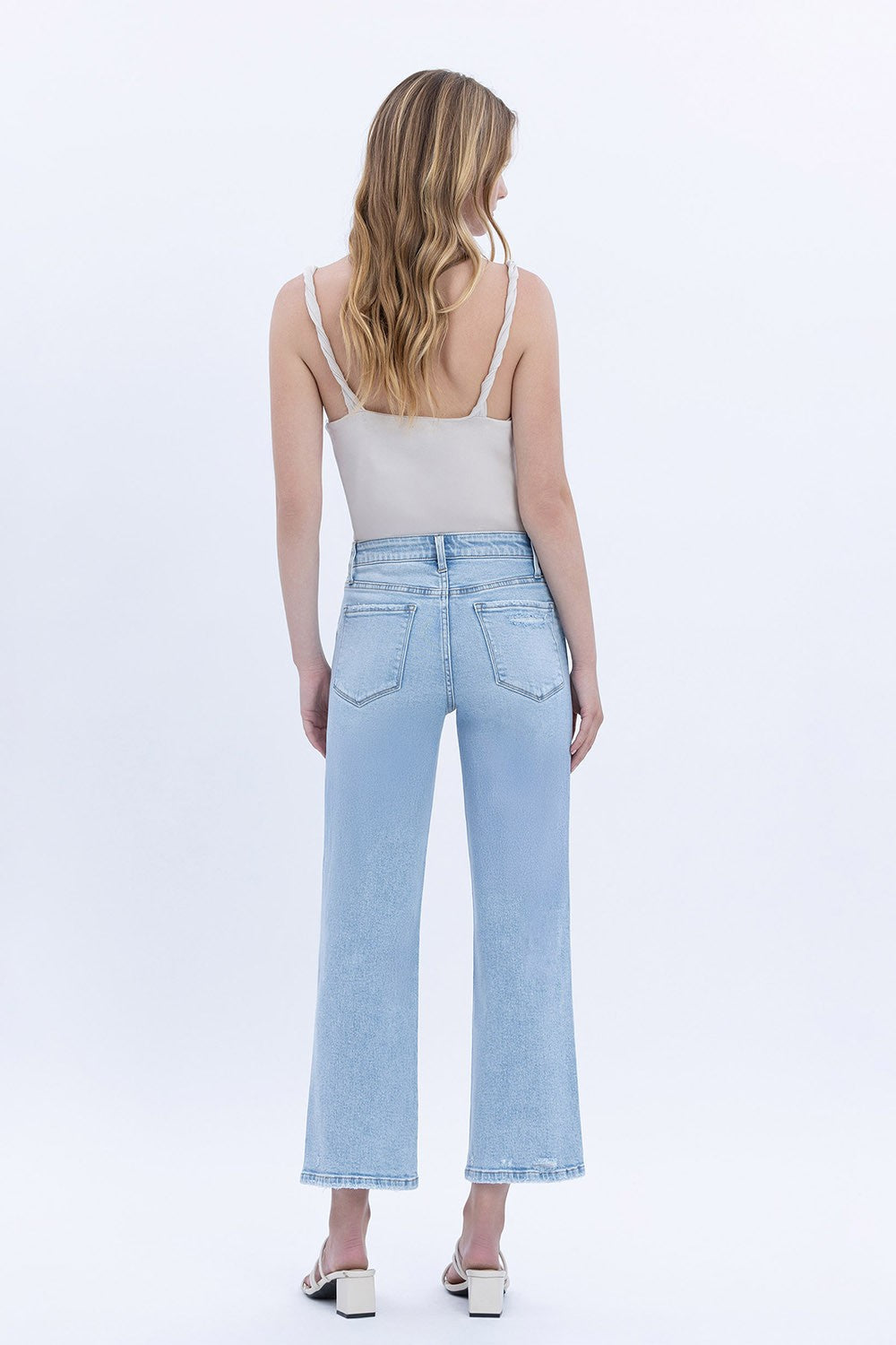 Cindy high-rise light wash slim wide-leg jeans with a crop length silhouette.