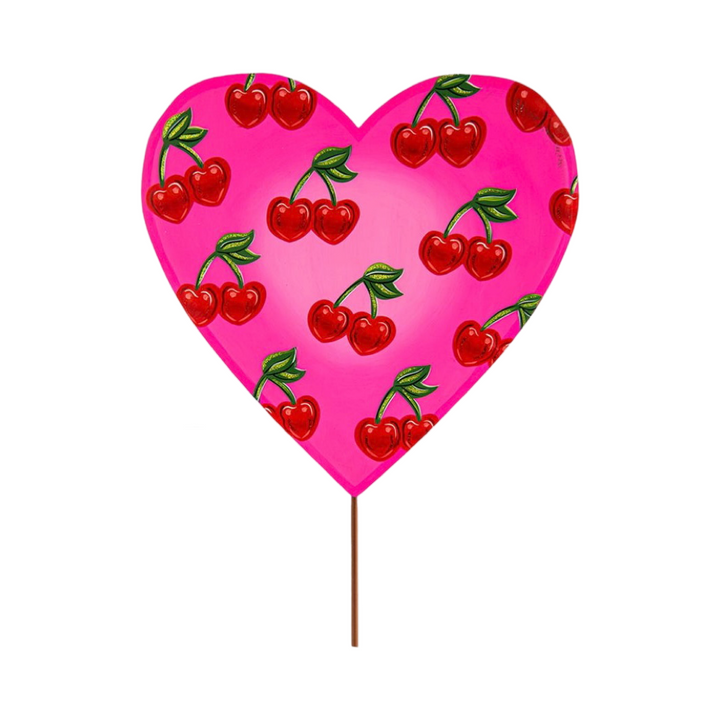 Metal garden stake with a pink cherry heart shape on top.