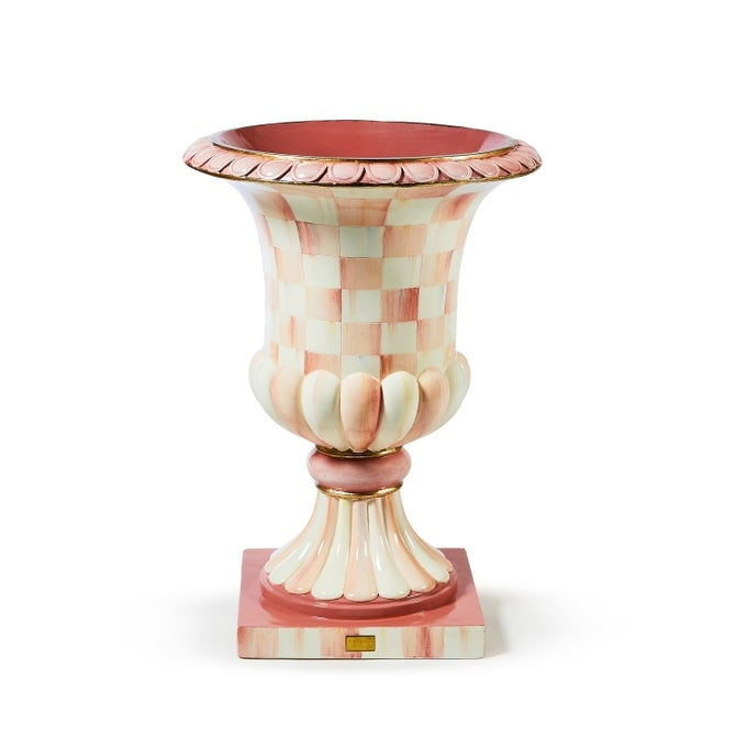 Rosy check pedestal urn made of fiberglass resin with a round shape.