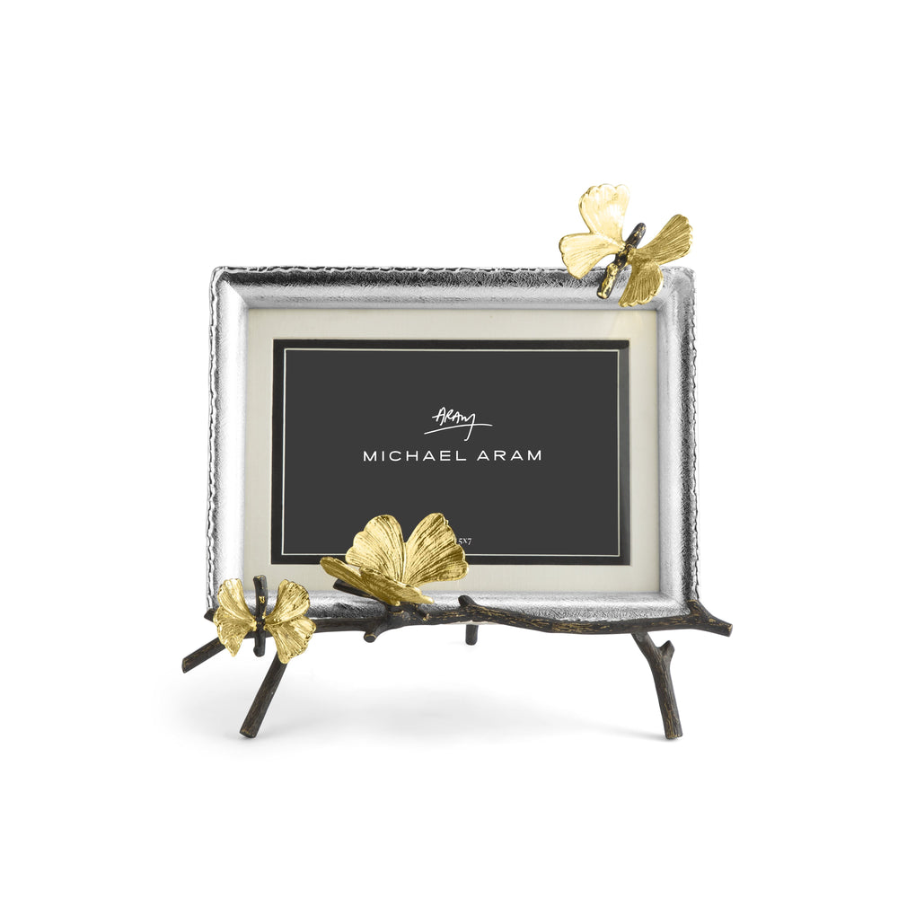 Natural brass easel frame holding a photo with oxidized nickelplate accents.