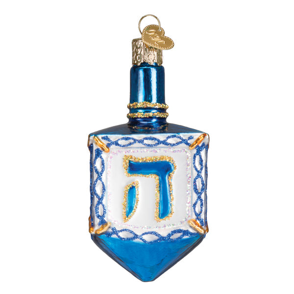 Blue and white glass dreidel ornament with gold glitter accents and a Hebrew letter.
