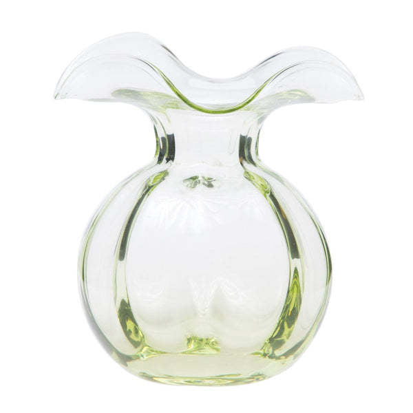 Medium green glass fluted vase with a wide mouth and tapered base.