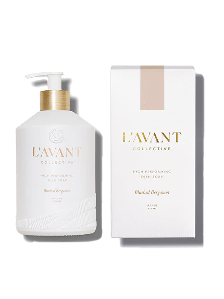 Matte white glass bottle with gold pump containing Blushed Bergamot dish soap