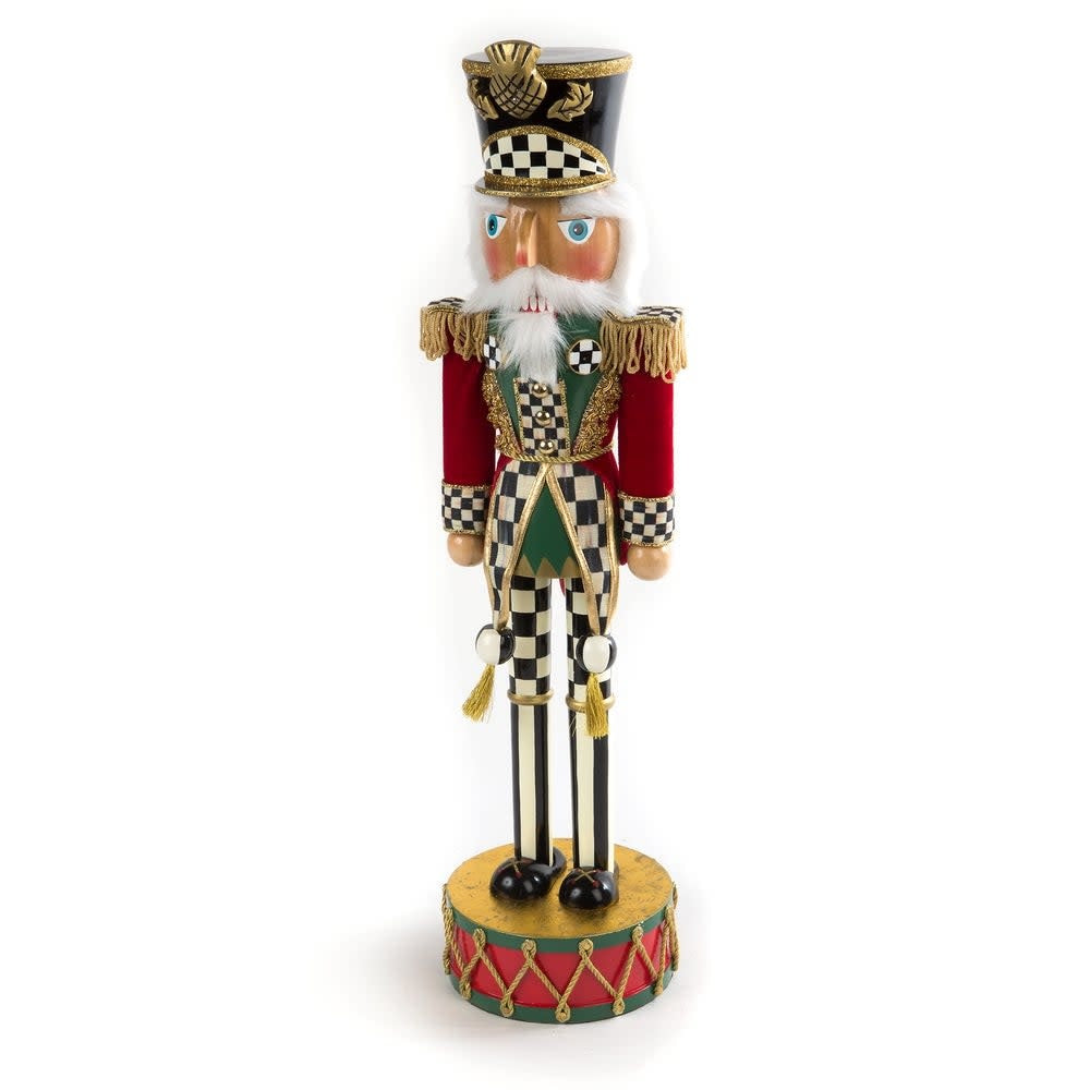 Handmade Highland nutcracker soldier in Courtly Check fabric with willow wood body and MDF base.