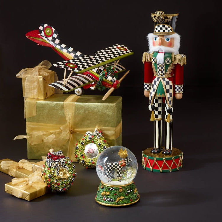 Handmade Highland nutcracker soldier in Courtly Check fabric with willow wood and MDF body.