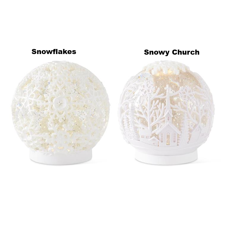 Two white cutout LED spinning water globes featuring snowflake and snowy church designs.