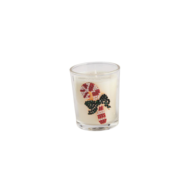 Vanilla scented tea light candle in a glass votive with a beaded candy cane icon and green bow.