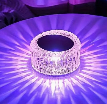 Rechargeable acrylic table light with remote control in clear crystal finish.