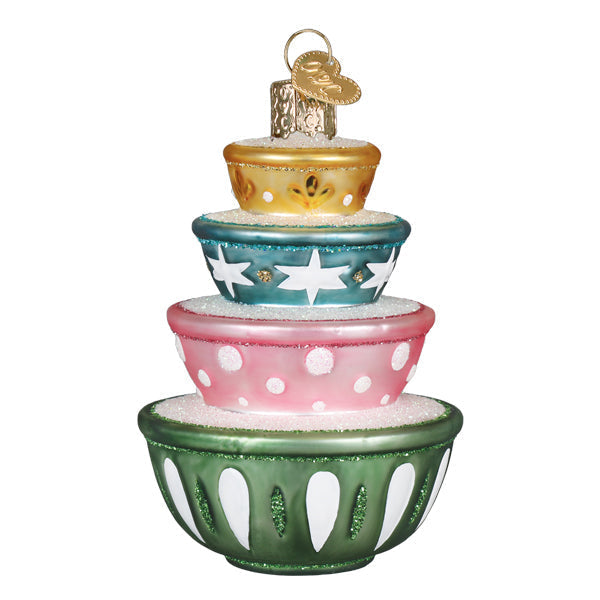 Stacked ceramic mixing bowl ornaments in cheerful holiday colors with a glossy finish.