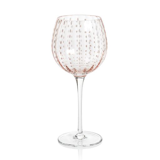 Portofino white dot wine glass in pink with a dotted pattern on the bowl.