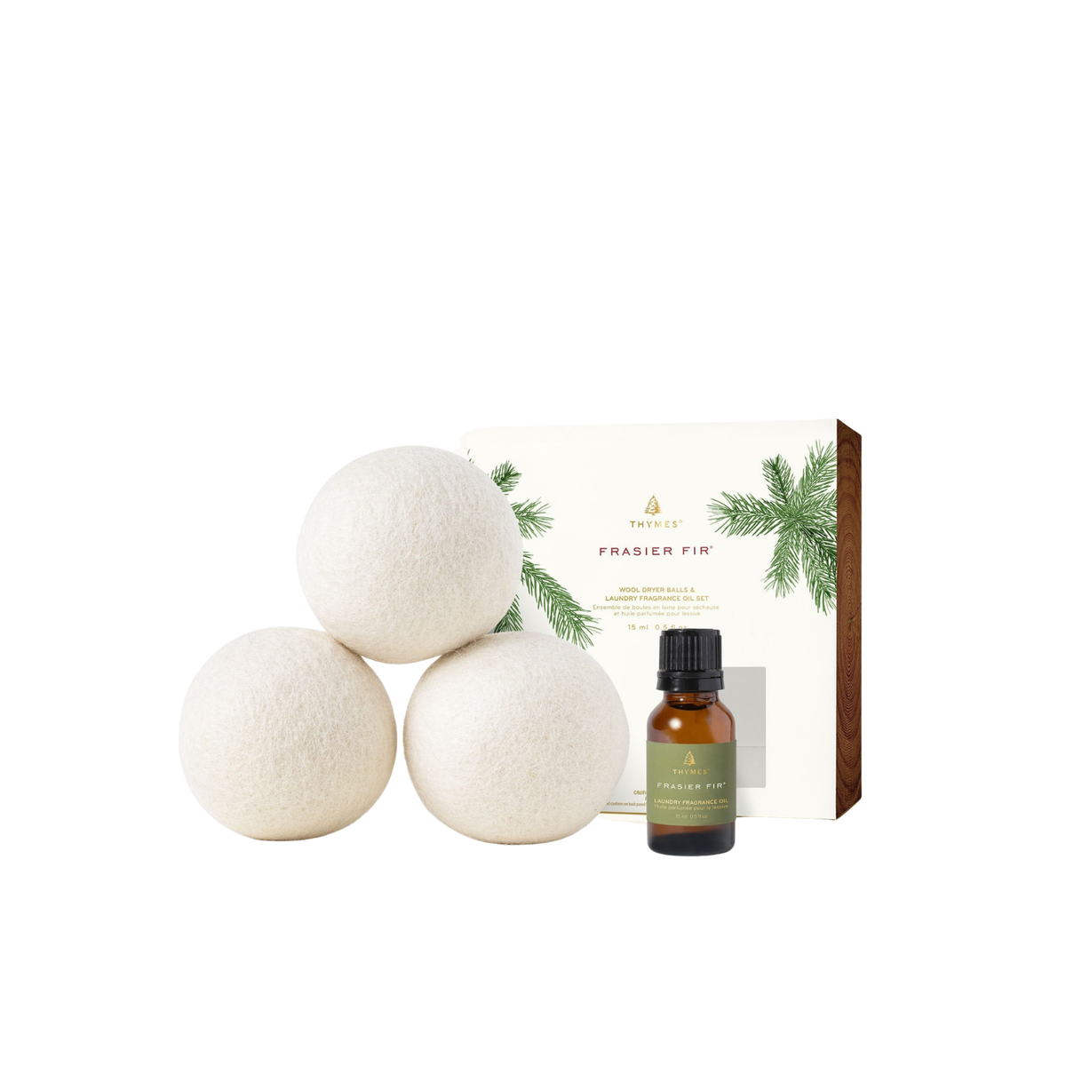 Frasier Fir Wool Dryer Balls & Laundry Fragrance Oil Set with three white wool balls and oil bottle.