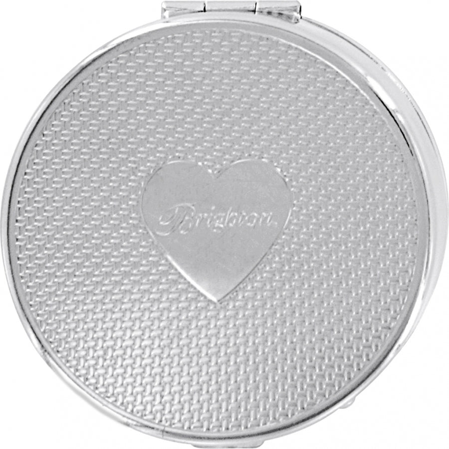 Silver-plated pressure-release pill box with red accents