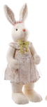 Large white ceramic bunny figurine with a smooth rounded silhouette designed as Easter table decor.