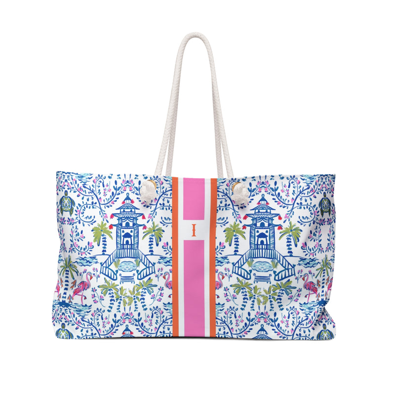 Mahjong Tote Bag with blue pagoda and flamingo print, pink and orange stripes, and rope handles.