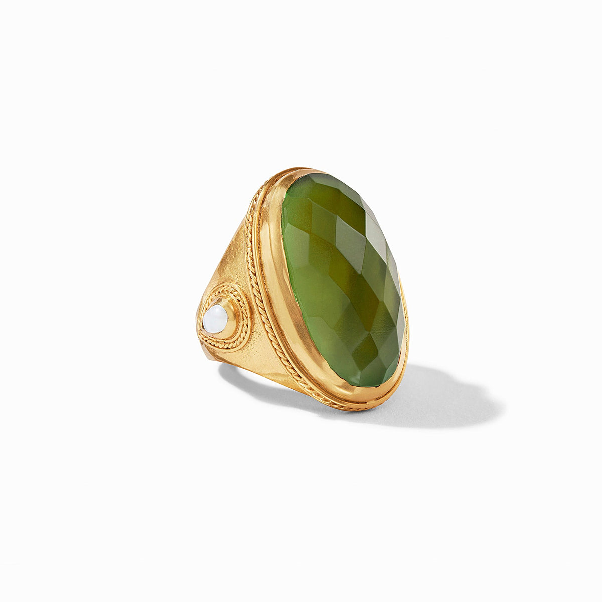 Gold-plated Cannes statement ring featuring a pear-shaped gemstone with mother-of-pearl accents and twisted wire detail.