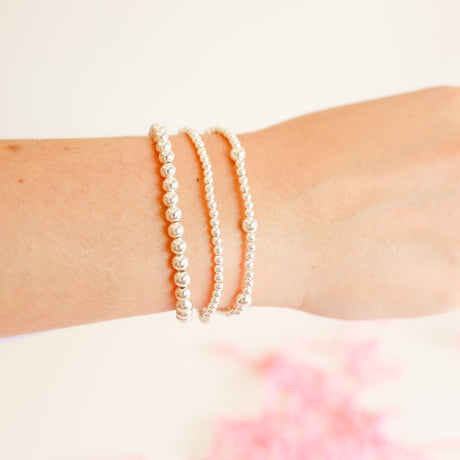 Silver basic bracelet featuring a sleek minimalist chain link design with polished finish.