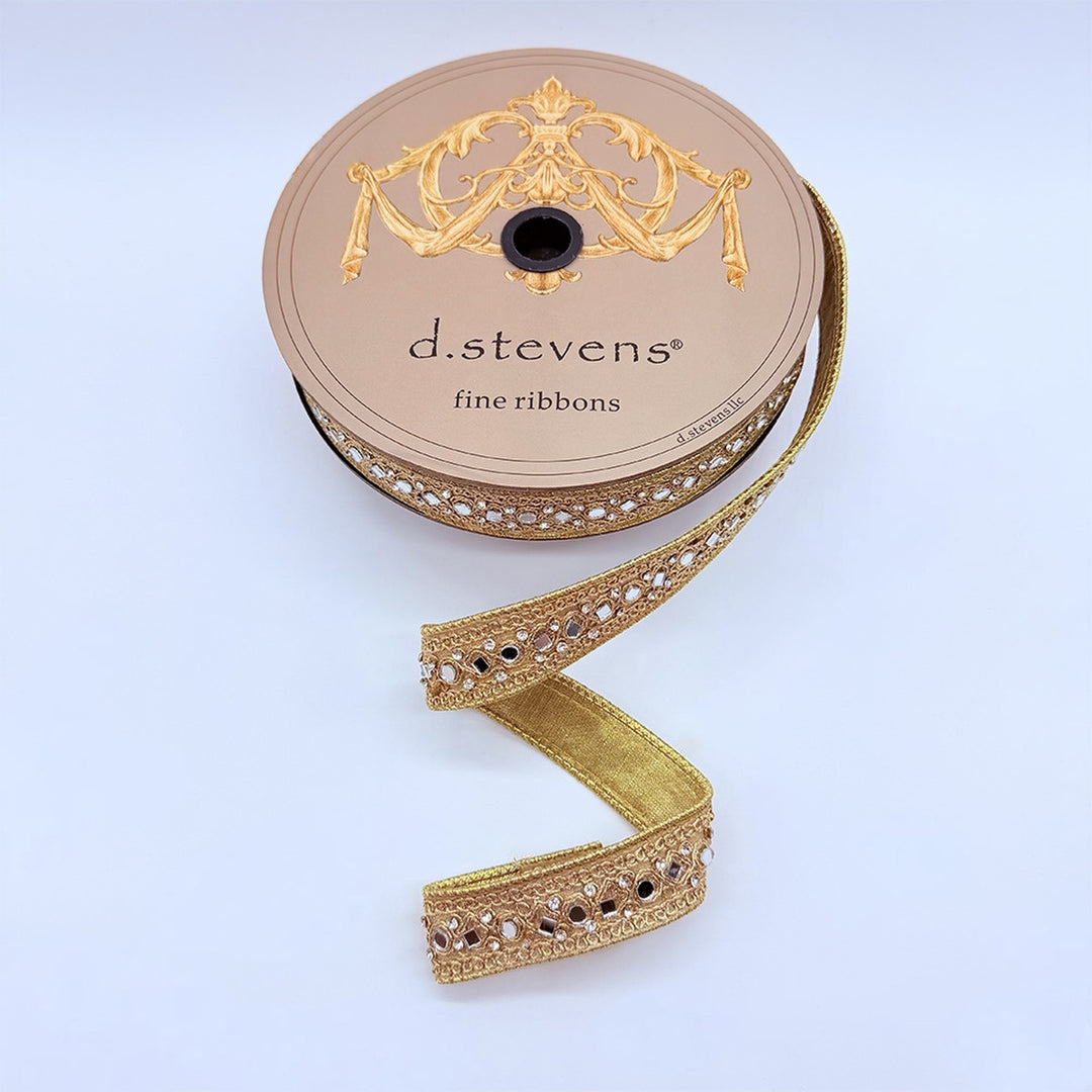 1 inch gold metallic ribbon with clear jewels and mirrors on a d.stevens spool.