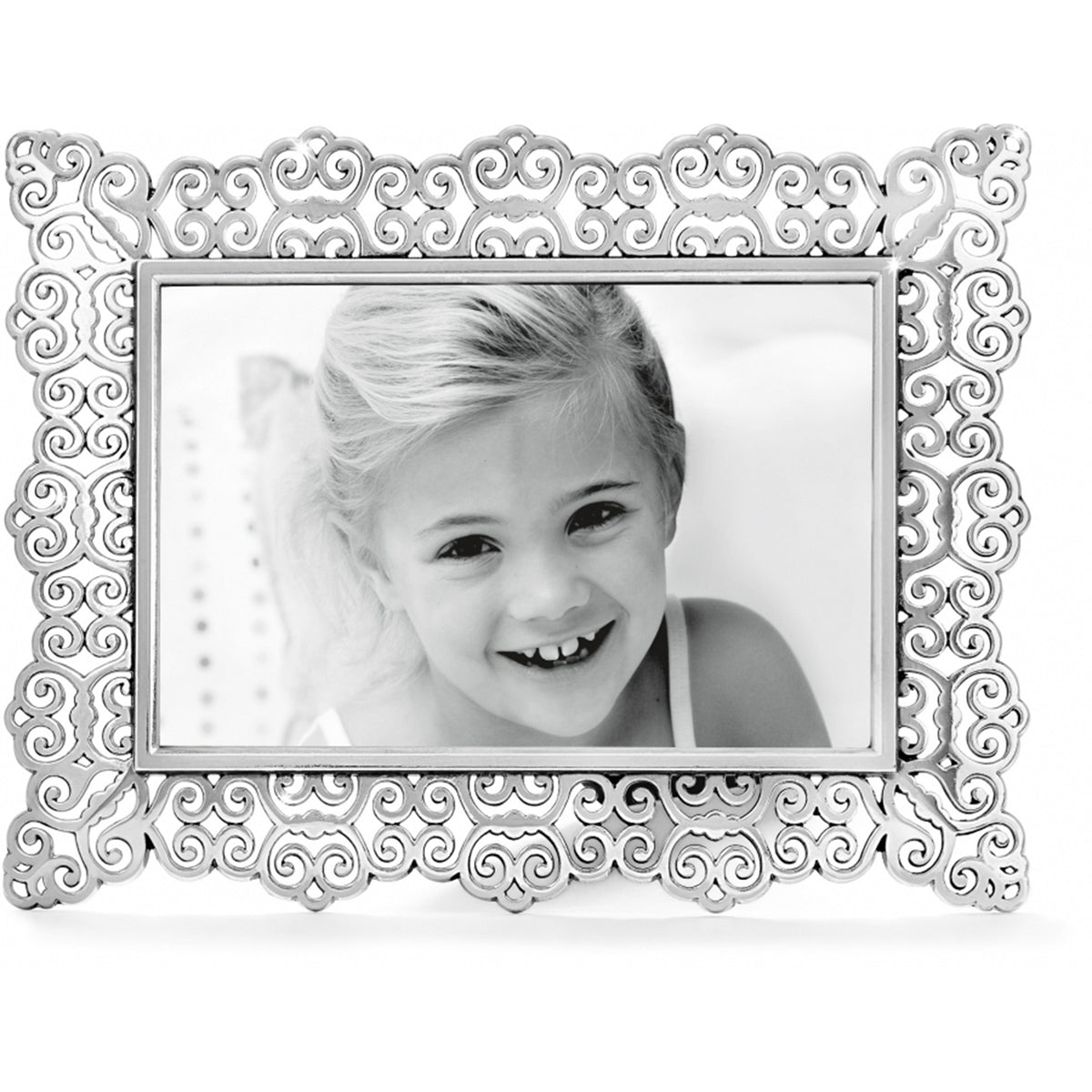 Silver plated Geneva Large Frame with Victorian-inspired cutout scrollwork holding a child's photo.