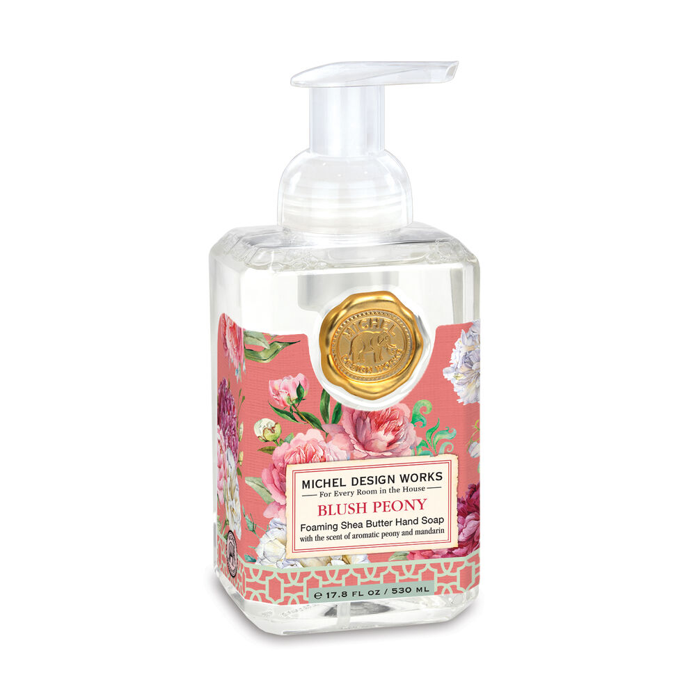 Spring Foaming Soap bottle with pump dispenser in a light green hue.