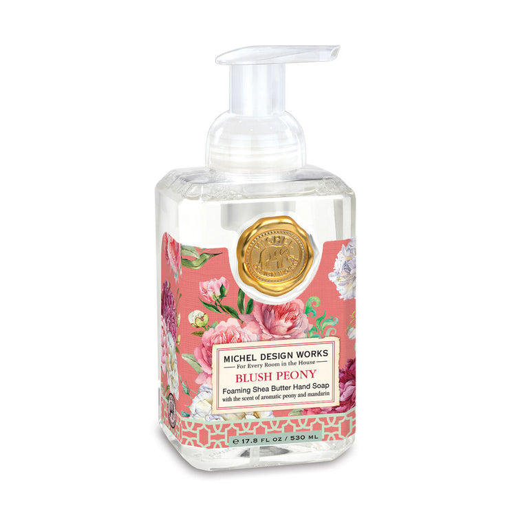 Spring Foaming Soap bottle with pump dispenser in a light green hue.