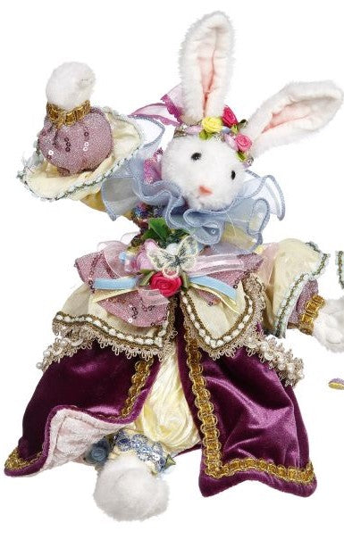 M&M COTTONTAIL rabbit figurine with a white cotton-like body, black ears and eyes, standing upright.