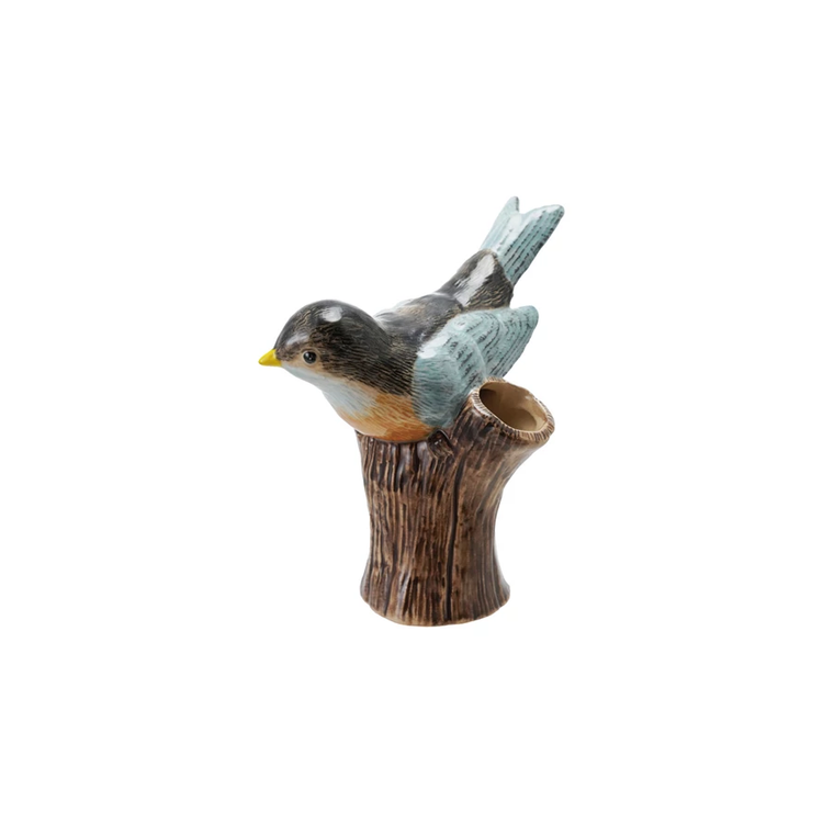 Hand-painted stoneware vase shaped like a bird perched on a brown log.